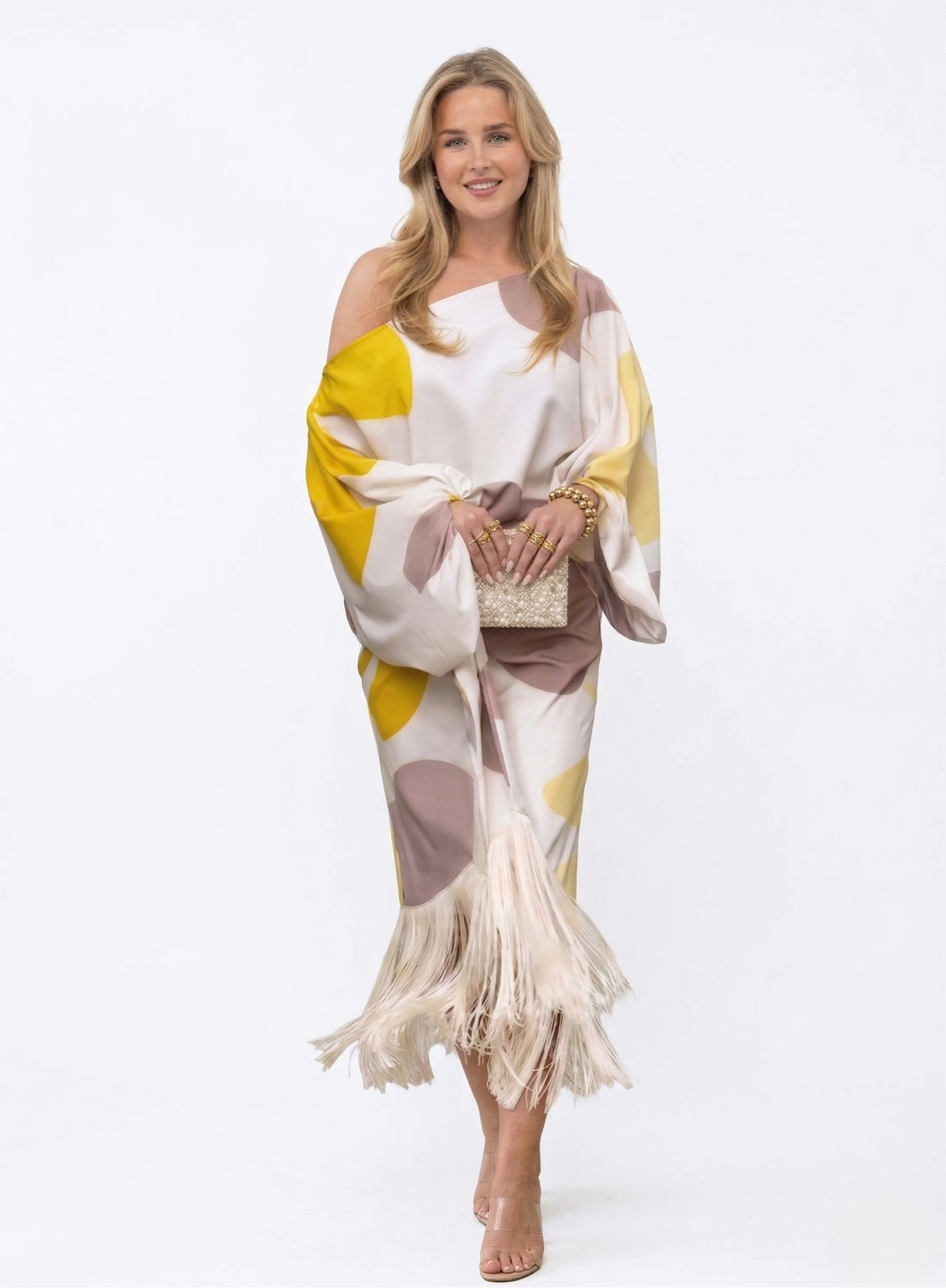 Daniela | Elegante vestido con flecos