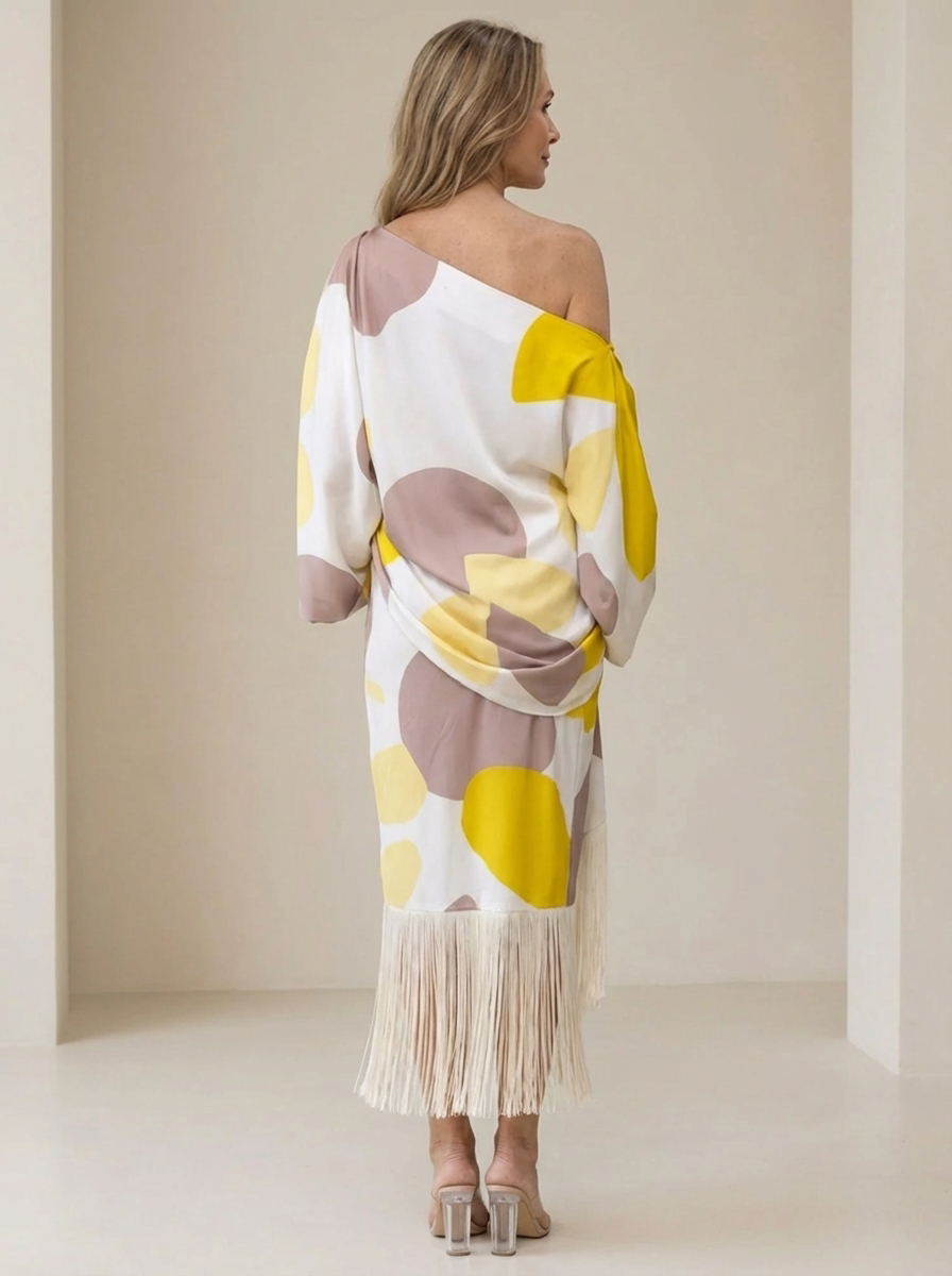 Daniela | Elegante vestido con flecos