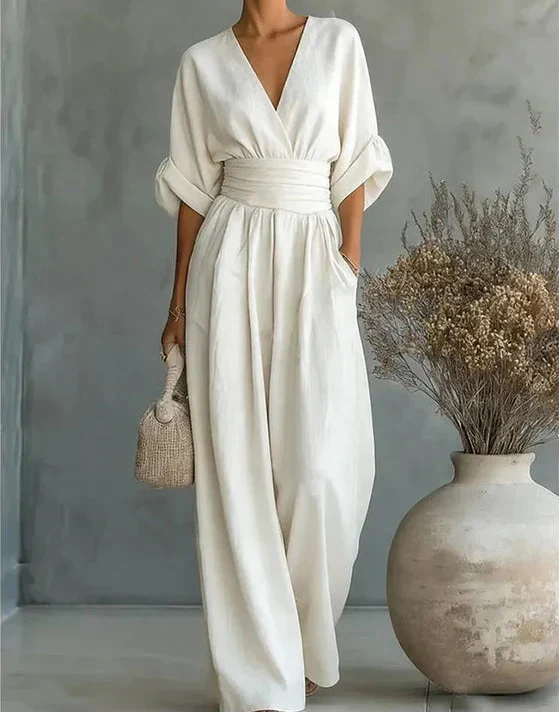 Dalia | Elegant jumpsuit med V-ringning och vida ben